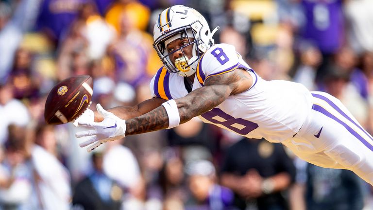 LSU's Malik Nabers (8) dives for the ball during a game against Texas A&M