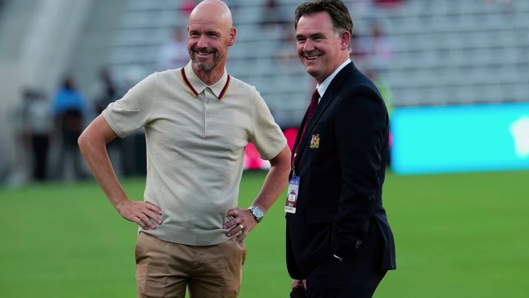 Man United manager Erik ten Hag pictured with outgoing football director John Murtough