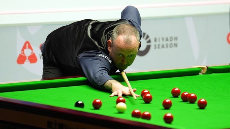 Mark Williams in action against Si Jiahui (not pictured) on day three of the 2024 Cazoo World Snooker Championship at the Crucible Theatre, Sheffield. Picture date: Monday April 22, 2024.