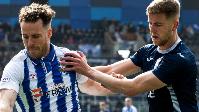 KILMARNOCK, SCOTLAND - APRIL 06: Kilmarnock's Marley Watkins and Ross County's Ryan Leak in action during a cinch Premiership match between Kilmarnock and Ross County at Rugby Park, on April 06, 2024, in Kilmarnock, Scotland. (Photo by Craig Foy / SNS Group)