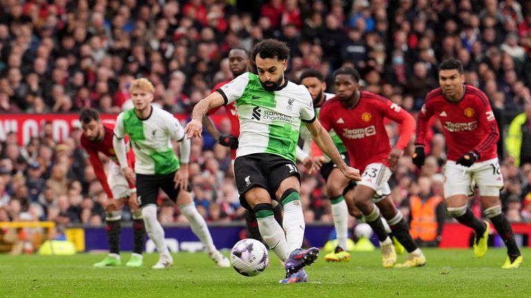 Liverpool's Mohamed Salah scores their second goal from the penalty spot