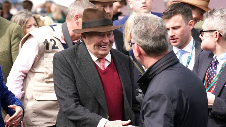 Nicky Henderson celebrates victory at Aintree