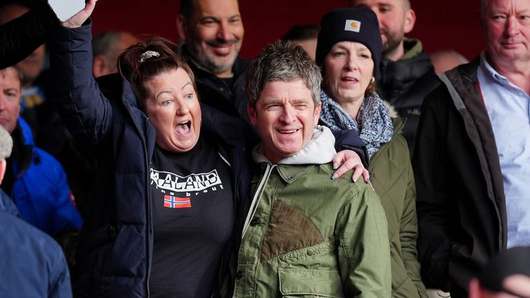 Noel Gallagher celebrates in the away end on Sunday