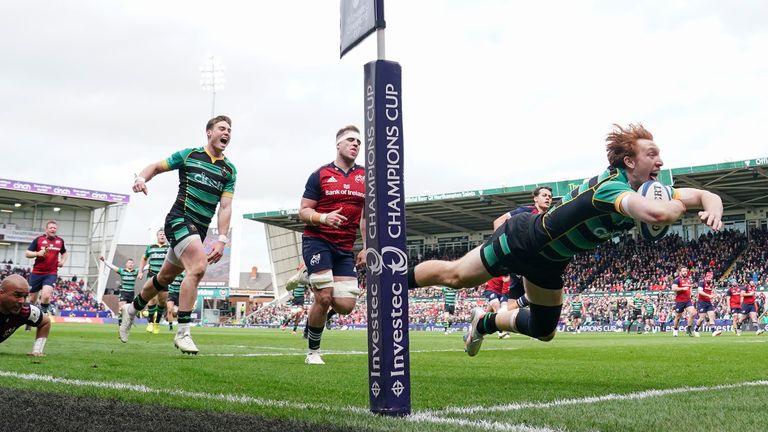 Northampton Saints' George Hendy dives over to score his side's fourth try against Munster