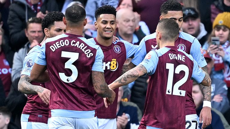 Ollie Watkins celebrates with team-mates after heading Villa in front