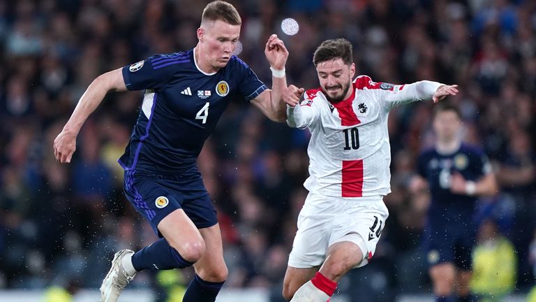 Scotland's Scott McTominay (left) and Georgia's Otar Kiteishvili battle for the ball during the UEFA Euro 2024 Qualifying Group A match at Hampden Park, Glasgow. Picture date: Tuesday June 20, 2023.