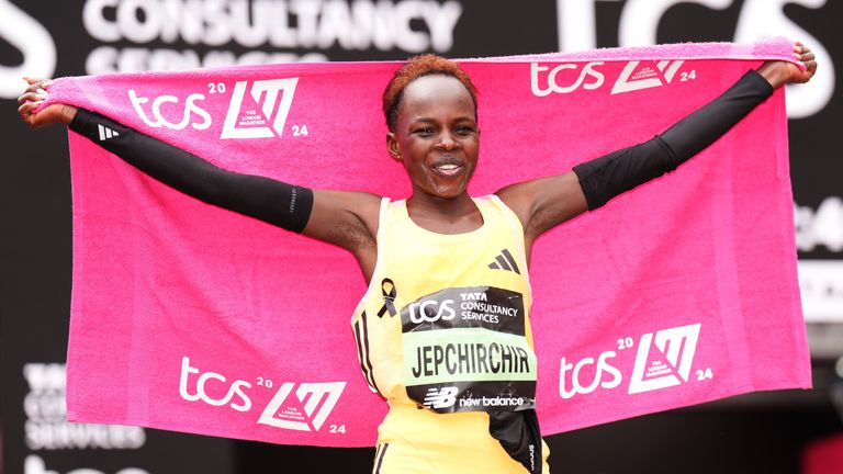Peres Jepchirchir celebrates winning the women's elite race and breaking the women's record during the TCS London Marathon