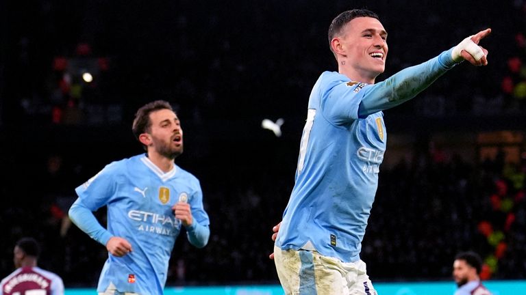 Phil Foden celebrates scoring his second, City's third, goal of the game