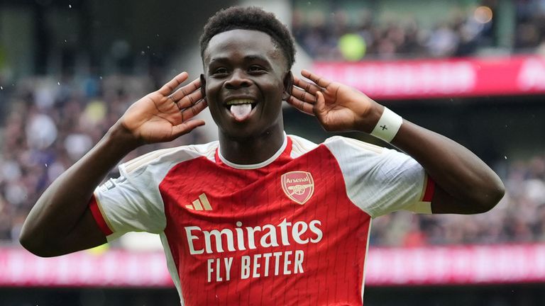 Bukayo Saka celebrates after doubling Arsenal's lead at Spurs