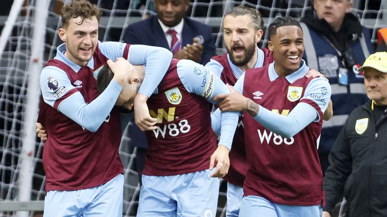 Josh Brownhill is mobbed by his team-mates after scoring Burnley's opening goal against Brighton