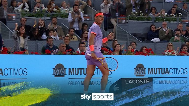 Rafael Nadal celebrates after breaking back against Alex De Minaur at the Madrid Open