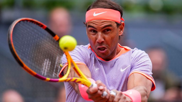Rafael Nadal of Spain returns the ball to Darwin Blanch of United States during the Mutua Madrid Open tennis tournament in Madrid, Thursday, April 25, 2024. (AP Photo/Manu Fernandez)