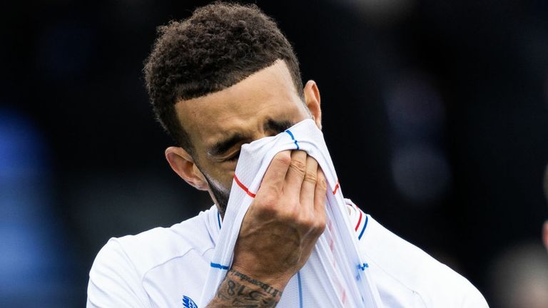 Rangers' Connor Goldson puts his head in his shirt after defeat at Ross County