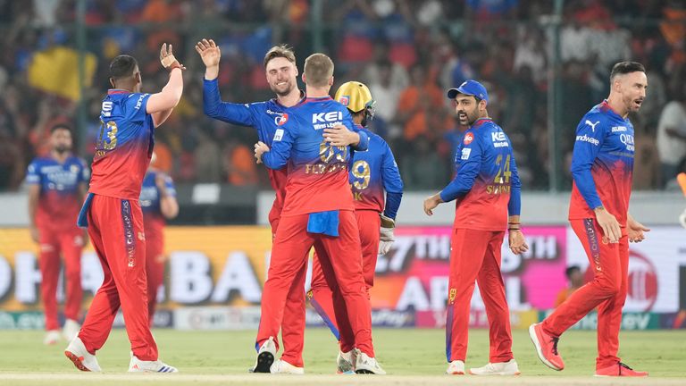 Royal Challengers Bengaluru celebrate their nine wicket victory against Gujarat Titans in the IPL