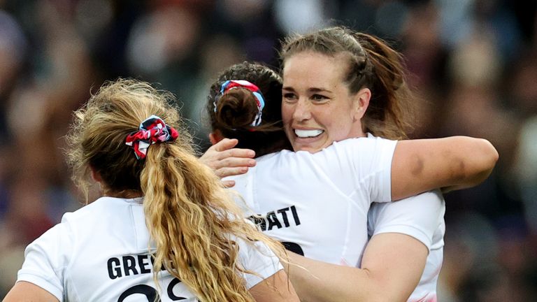 Maddie Feaunati of England celebrates victory with teammate Emily Scarratt after defeating France during the Guinness Women's Six Nations 2024 match between France and England at Stade Chaban-Delmas on April 27, 2024 in Bordeaux, France. 