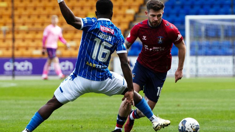 PERTH, SCOTLAND - APRIL 13: St Johnstone's Adama Sidibeh and Kilmarnock's Matty Kennedy in action during a cinch Premiership match between St Johnstone and Kilmarnock at McDiarmid Park, on April 13, 2024, in Perth, Scotland. (Photo by Sammy Turner / SNS Group)