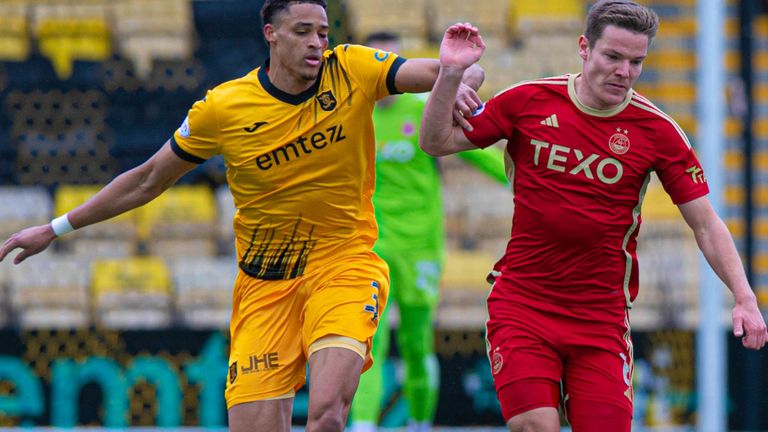 LIVINGSTON, SCOTLAND - APRIL 06: Aberdeen's Stefan Gartenmann (R) and Livingston's Tete Yengi in action during a cinch Premiership match between Livingston and Aberdeen at the Tony Macaroni Arena, on April 06, 2024, in Livingston, Scotland. (Photo by Sammy Turner / SNS Group)