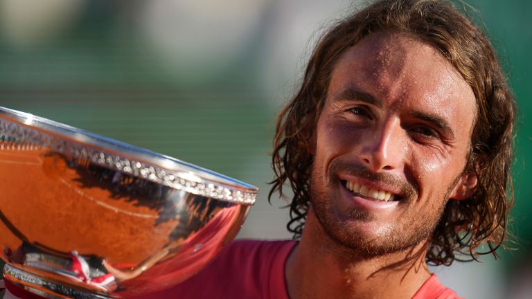Stefanos Tsitsipas..of Greece poses with the trophy after defeating Casper Ruud..of Norway to win the Monte Carlo Tennis Masters final match 6-1, 6-4 in Monaco, Sunday, April 14, 2024. (AP Photo/Daniel Cole)