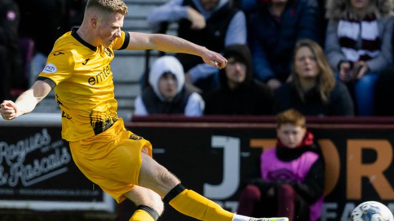EDINBURGH, SCOTLAND - APRIL 13: Livingston's Stephen Kelly scores to make it 2-0 during a cinch Premiership match between Heart of Midlothian and Livingston at Tynecastle Park, on April 13, 2024, in Edinburgh, Scotland. (Photo by Mark Scates / SNS Group)