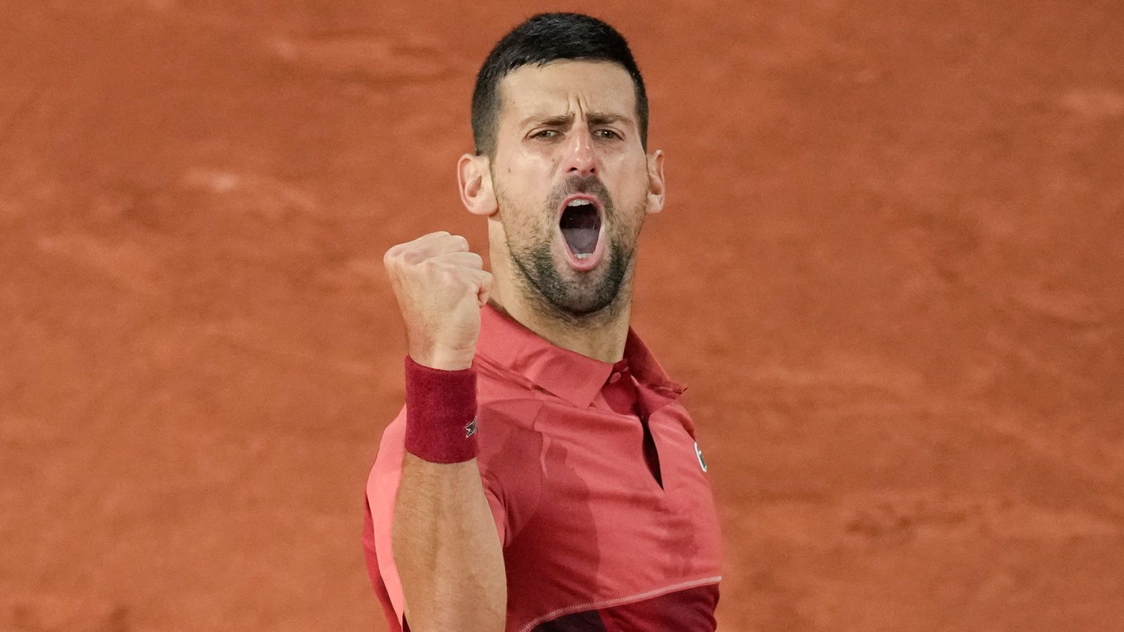 Novak Djokovic: Defending French Open champion up and running with victory over Pierre-Hugues Herbert