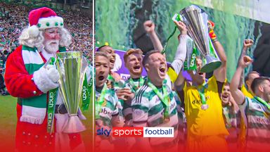 Celtic lift Premiership trophy but why is Santa delivering it!!