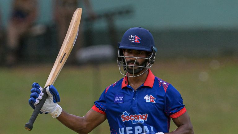 Nepal's Aasif Sheikh celebrates after scoring a half-century during the Asia Cup 2023 ODI match against India at the Pallekele International Cricket Stadium. 