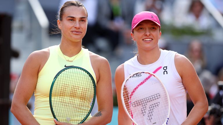 Aryna Sabalenka of Belarus and Iga Swiatek of Poland meet at the net prior to the Women's Singles Final match on Day Twelve of Mutua Madrid Open at La Caja Magica on May 04, 2024 in Madrid, Spain. (Photo by Julian Finney/Getty Images)