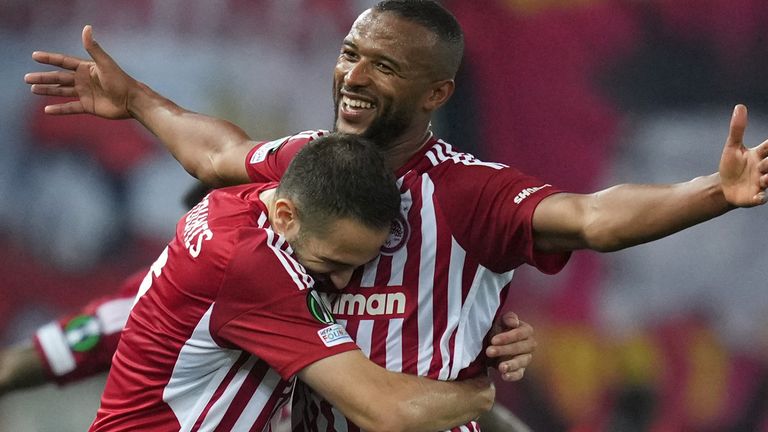 PIRAEUS, GREECE - MAY 09: Ayoub El Kaabi of Olympiakos celebrates with teammate Kostas Fortounis after scoring his team's second goal during the UEFA Europa Conference League 2023/24 Semi-Final second leg match between Olympiacos FC and Aston Villa at Stadio Georgios Karaiskakis on May 09, 2024 in Piraeus, Greece. (Photo by Alex Caparros - UEFA/UEFA via Getty Images)