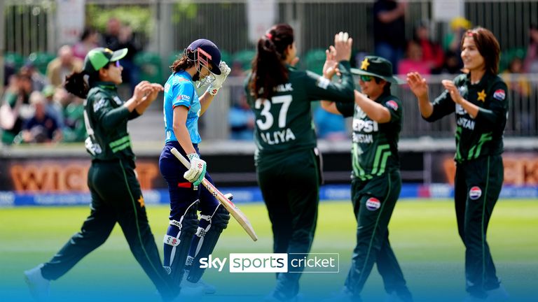 England's Maia Bouchier walks off after Pakistan's Fatima Sana makes the catch 