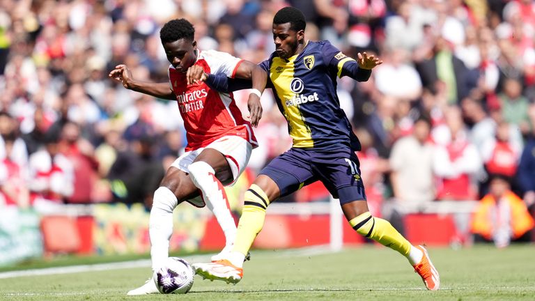 Arsenal's Bukayo Saka and Bournemouth's Dango Ouattara (right) battle for the ball