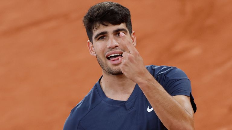 Spain's Carlos Alcaraz gestures during his second round match of the French Open tennis tournament against Netherlands' Jesper de Jong at the Roland Garros stadium in Paris, Wednesday, May 29, 2024. (AP Photo/Jean-Francois Badias)