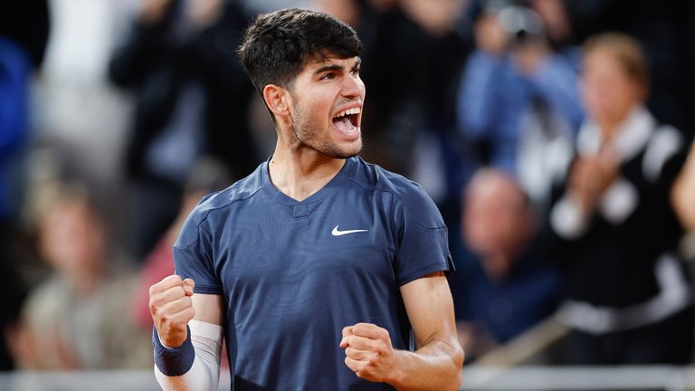 Spain's Carlos Alcaraz celebrates winning his second round match of the French Open tennis tournament against Netherlands' Jesper de Jong at the Roland Garros stadium in Paris, Wednesday, May 29, 2024. (AP Photo/Jean-Francois Badias)