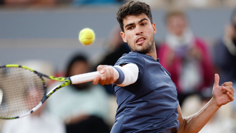 Spain's Carlos Alcaraz plays a shot against Netherlands' Jesper de Jong during their second round match of the French Open tennis tournament at the Roland Garros stadium in Paris, Wednesday, May 29, 2024. (AP Photo/Jean-Francois Badias)