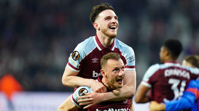 West Ham United's Declan Rice (top) celebrates with team-mate Vladimir Coufal victory after the final whistle in the UEFA Europa League quarter final, second leg match at the Groupama Stadium in Lyon, France. Picture date: Thursday April 14, 2022.