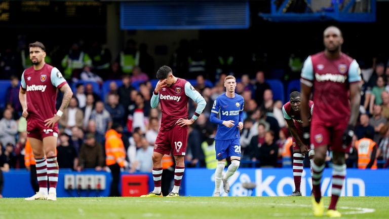 West Ham's Edson Alvarez and his team-mates look dejected after Chelsea score their third goal