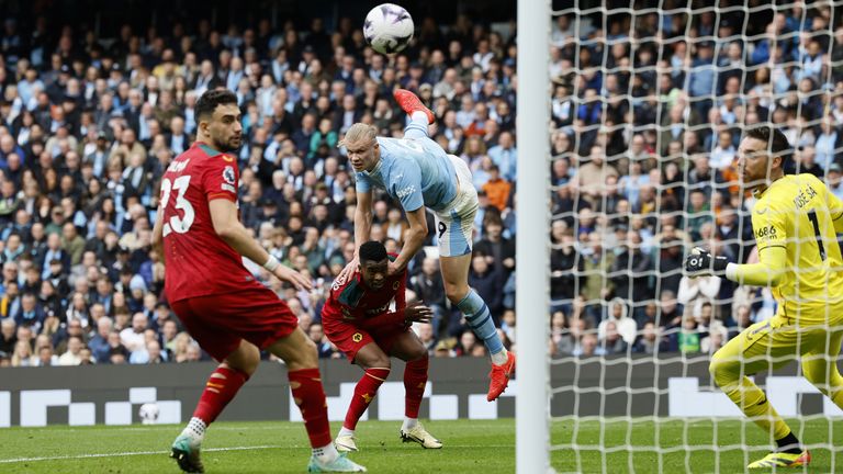 Erling Haaland heads Man City into a two-goal lead