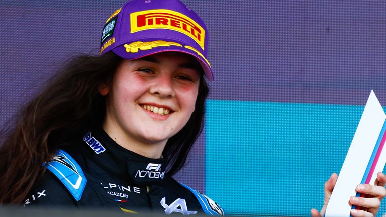 JEDDAH STREET CIRCUIT, SAUDI ARABIA - MARCH 08: Abbi Pulling (GBR, Rodin Motorsport), 2nd position, receives her trophy during the Jeddah at Jeddah Street Circuit on March 08, 2024 in Jeddah Street Circuit, Saudi Arabia. (Photo by Sam Bloxham / LAT Images)