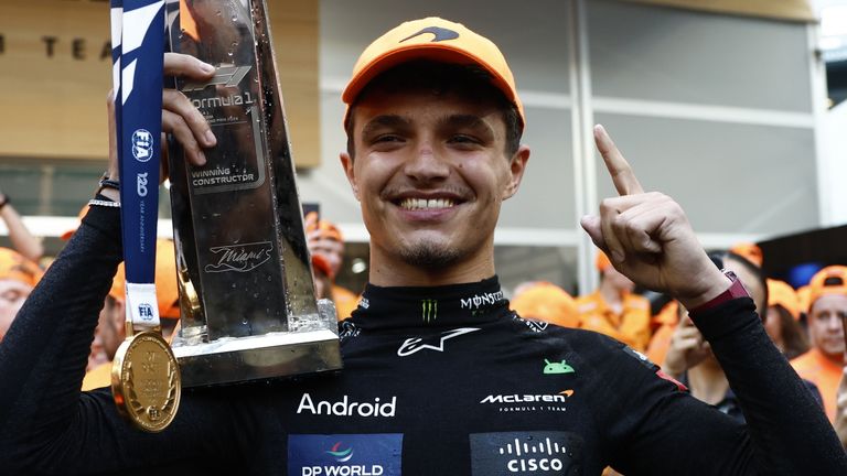 MIAMI INTERNATIONAL AUTODROME, UNITED STATES OF AMERICA - MAY 05: Lando Norris, McLaren F1 Team, 1st position, celebrates with his trophy during the Miami GP at Miami International Autodrome on Sunday May 05, 2024 in Miami, United States of America. (Photo by Zak Mauger / LAT Images)