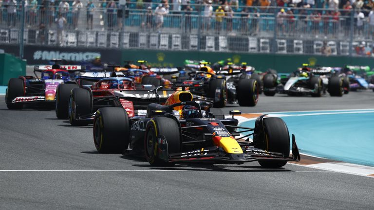 MIAMI INTERNATIONAL AUTODROME, UNITED STATES OF AMERICA - MAY 04: Max Verstappen, Red Bull Racing RB20, leads Charles Leclerc, Ferrari SF-24, and Daniel Ricciardo, VCARB 01 during the Miami GP at Miami International Autodrome on Saturday May 04, 2024 in Miami, United States of America. (Photo by Sam Bloxham / LAT Images)