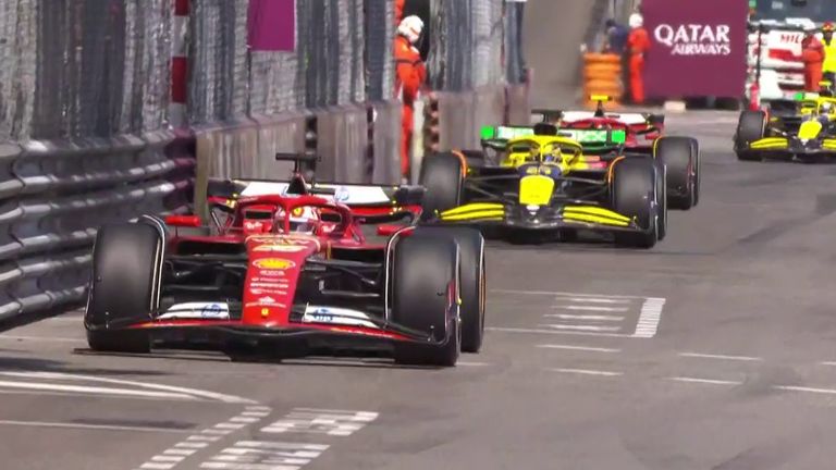 Charles Leclerc leads Oscar Piastri at the Monaco GP