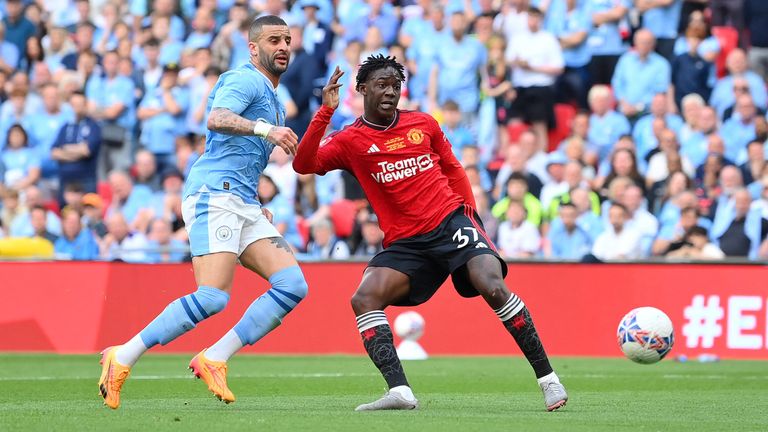 Kobbie Mainoo doubles Manchester United's lead against Manchester City in the FA Cup final