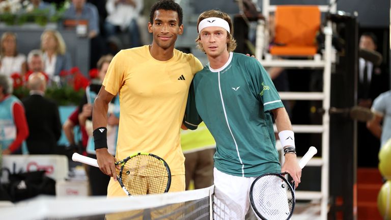 Felix Auger-Aliassime of Canada and Andrey Rublev meet at the net prior to the Men's Singles Final match on Day Thirteen at La Caja Magica on May 05, 2024 in Madrid, Spain. (Photo by Clive Brunskill/Getty Images)