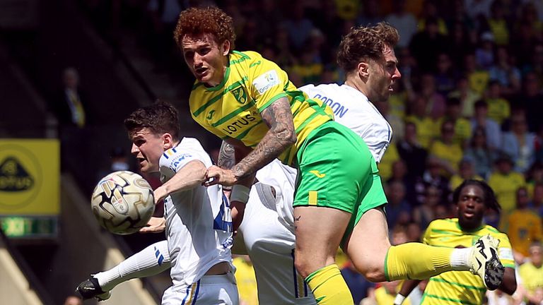 Josh Sargent challenges for a header against Leeds
