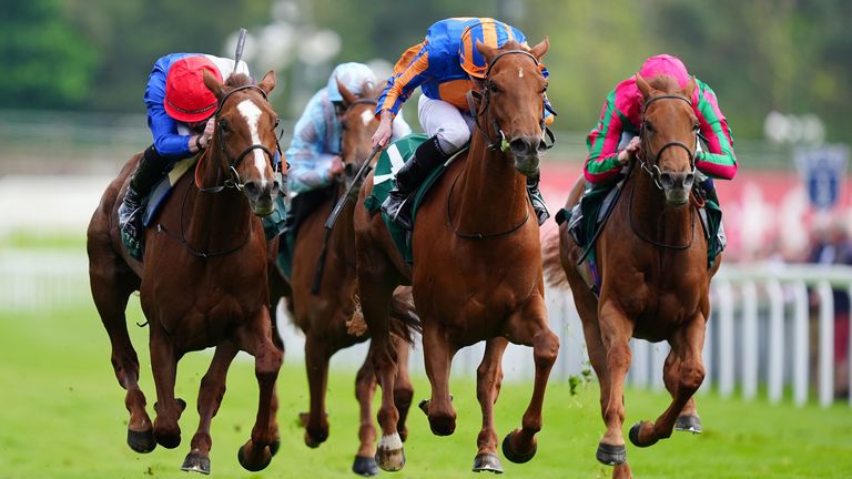 Forest Fairy (left, red cap) dug deep to win the Cheshire Oaks for Ralph Beckett and Rossa Ryan 