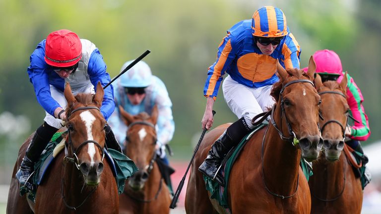 Forest Fairy ridden by Rossa Ryan (left) on their way to winning the Weatherbys ePassport Cheshire Oaks 