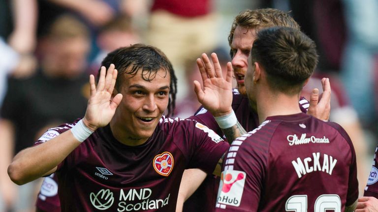 EDINBURGH, SCOTLAND - MAY 11: Hearts' Kenneth Vargas (L) celebrates after he scores to make it 1-0 with teammates Barry McKay (C) and Cammy Devlin (R) during a cinch Premiership match between Heart of Midlothian and Dundee at Tynecastle Park, on May 11, 2024, in Edinburgh, Scotland. (Photo by Paul Byars / SNS Group)