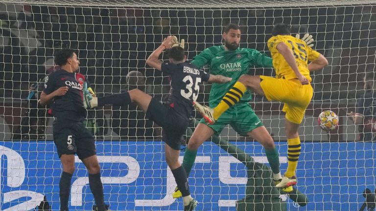 Dortmund's Mats Hummels scores his side's opening goal