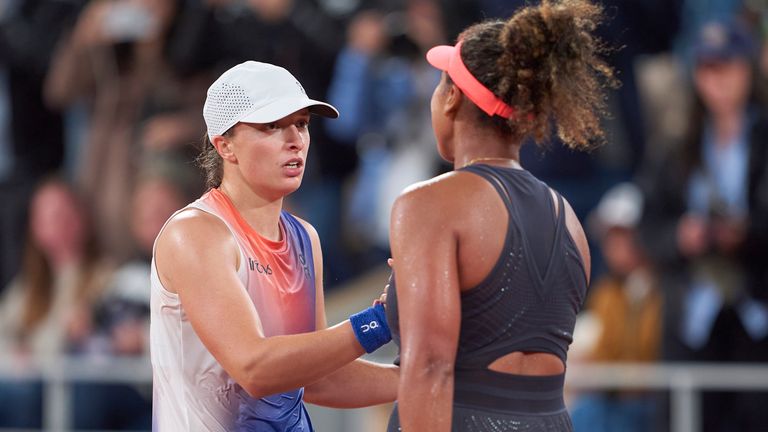 PARIS, FRANCE - MAY 29: Iga Swiatek of Poland embarces Naomi Osaka of Japan after their Women's Singles second round match on Day Four of the 2024 French Open at Roland Garros on May 29, 2024 in Paris, France. (Photo by Mateo Villalba/Getty Images)