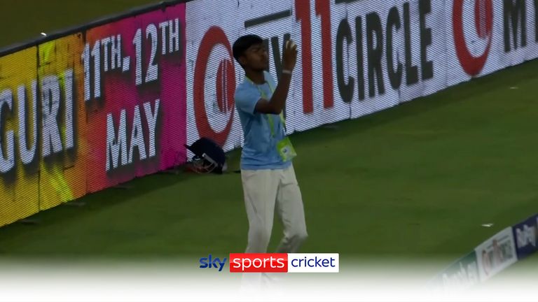 A ballboy takes a catch in the IPL.