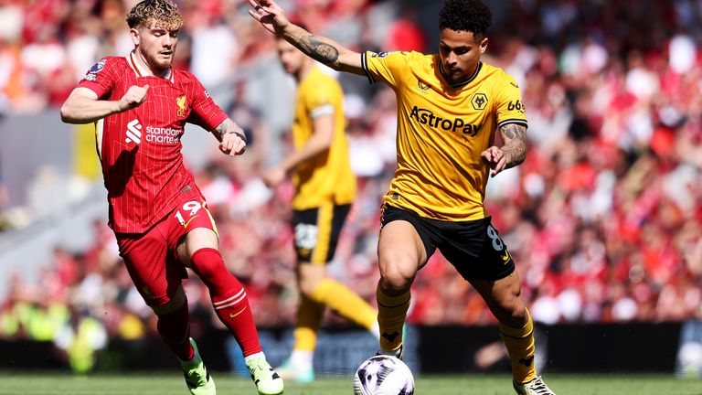 Joao Gomes and Harvey Elliott in action at Anfield